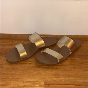 gold sandals, never worn, and in perfect condition